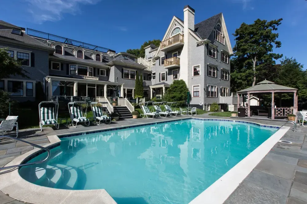 Heated outdoor pool surrounded by the inn's gardens