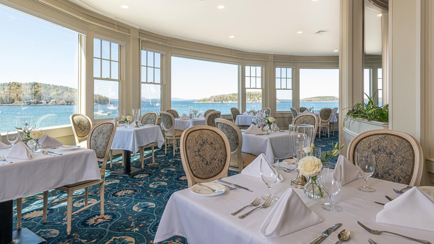 Reading Room Restaurant dining room with panoramic windows overlooking Frenchman Bay